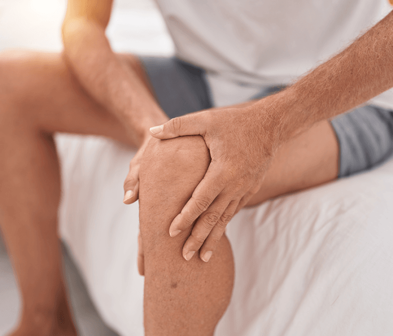 Sobrecarga de rodilla en gimnasio: guía de ajustes y progresión por fases